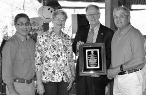 From left, Mark Champagne, United Ministries director; Libby Singletary; Mayor Joe McElveen; and Joel Singletary. Joel and Libby Singletary received the Mayor's Award for Outstanding Community Service.